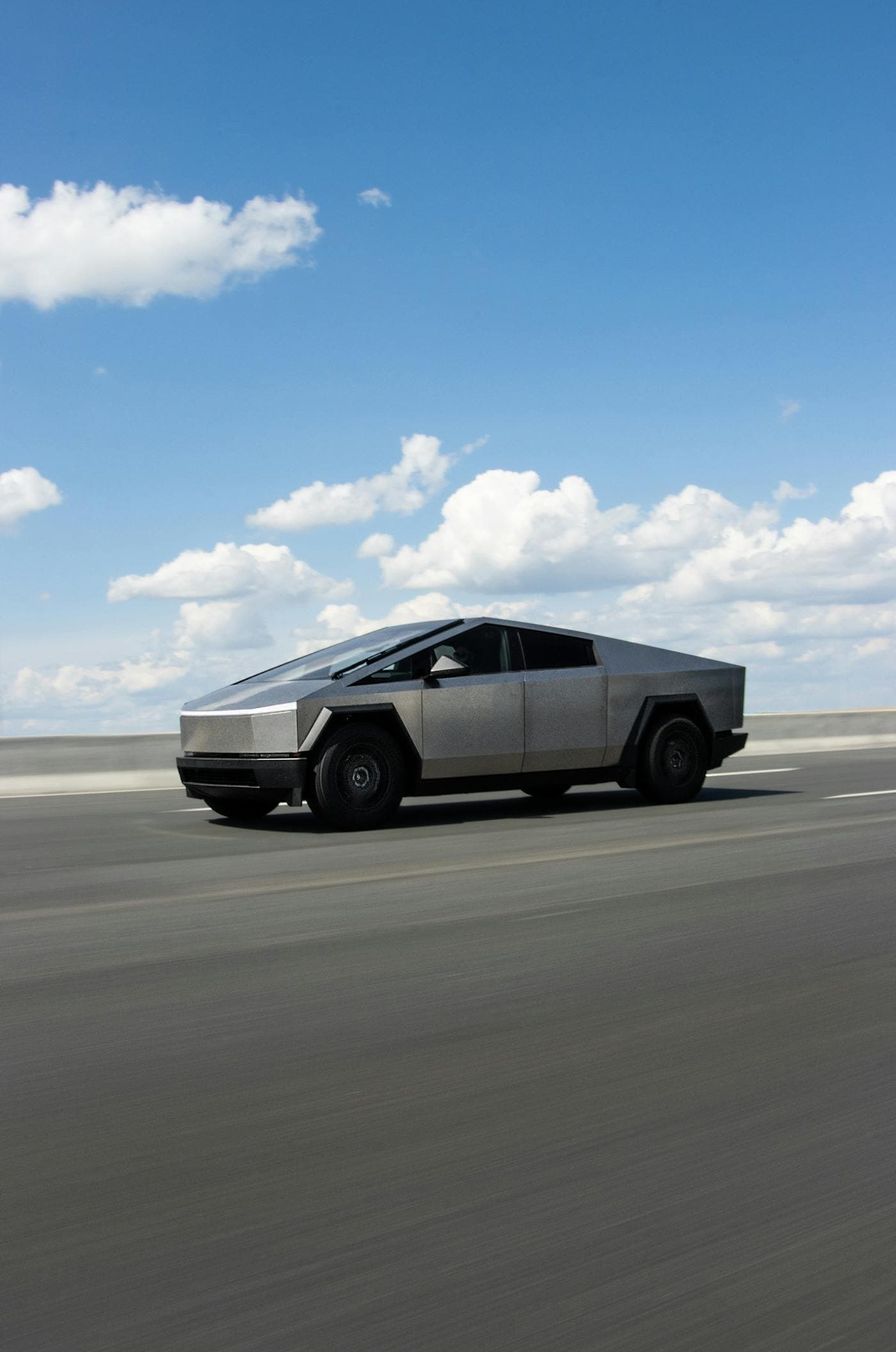 Tesla Cybertruck driving on a highway