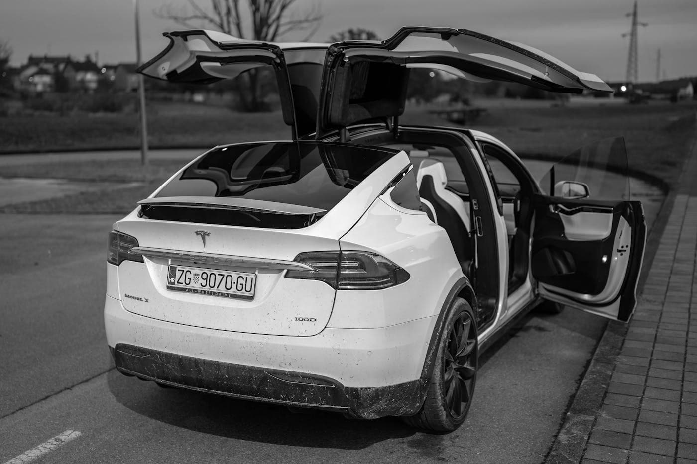 Tesla Model X with falcon-wing doors open